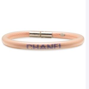 CHANEL peach mesh tube bracelet with purple logo